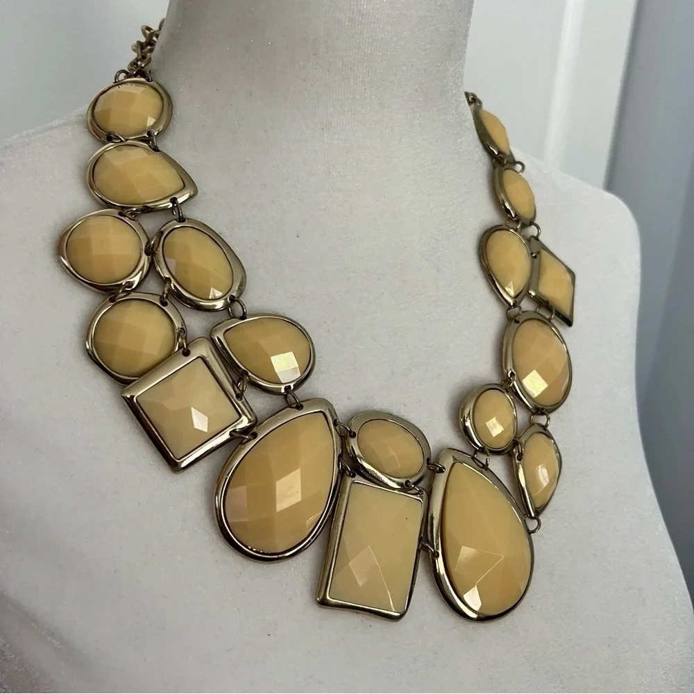 Cream colored faceted bead statement dramatic bib necklace on gold tone chain